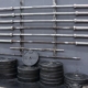 How Much Standard and Olympic Barbells Weigh for Workouts